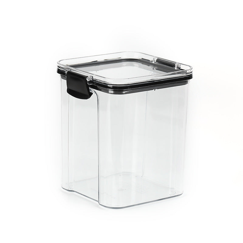 Clear storage container with black lid on a white background