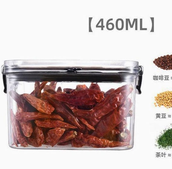 Clear container with red dried beans on a white background