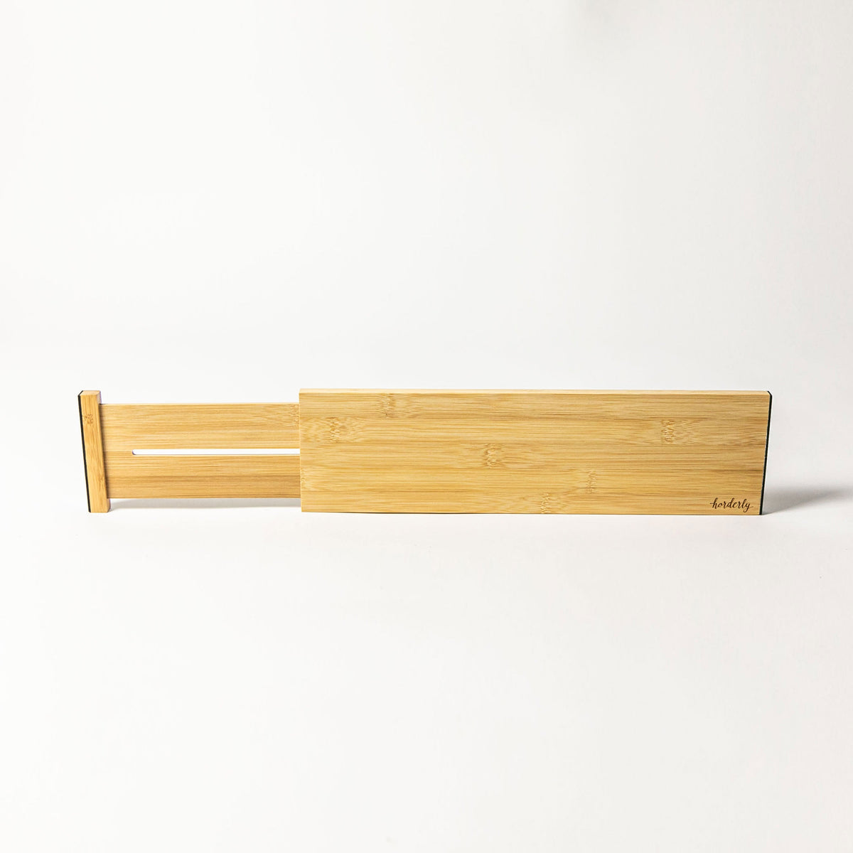Two wooden slats on a white background
