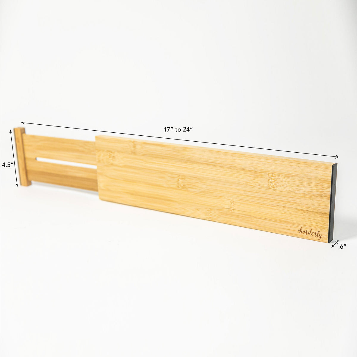 Wooden headboard with adjustable width measurement on a white background