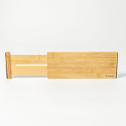 Bamboo headboard with a slatted design on a white background