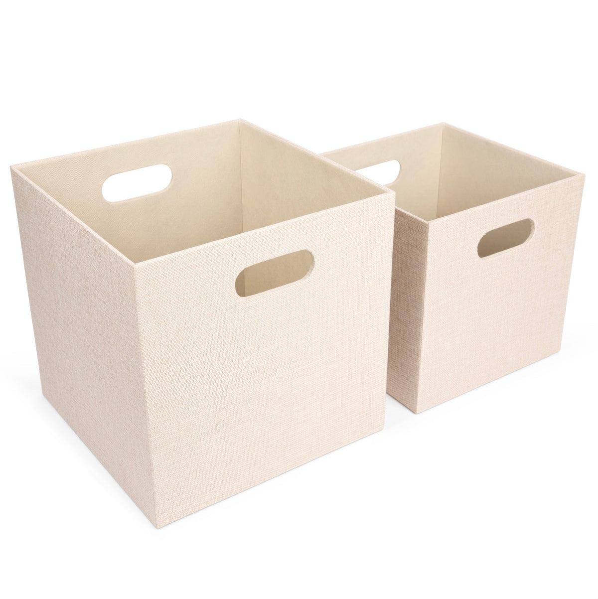 Two beige storage cubes with handles on a white background