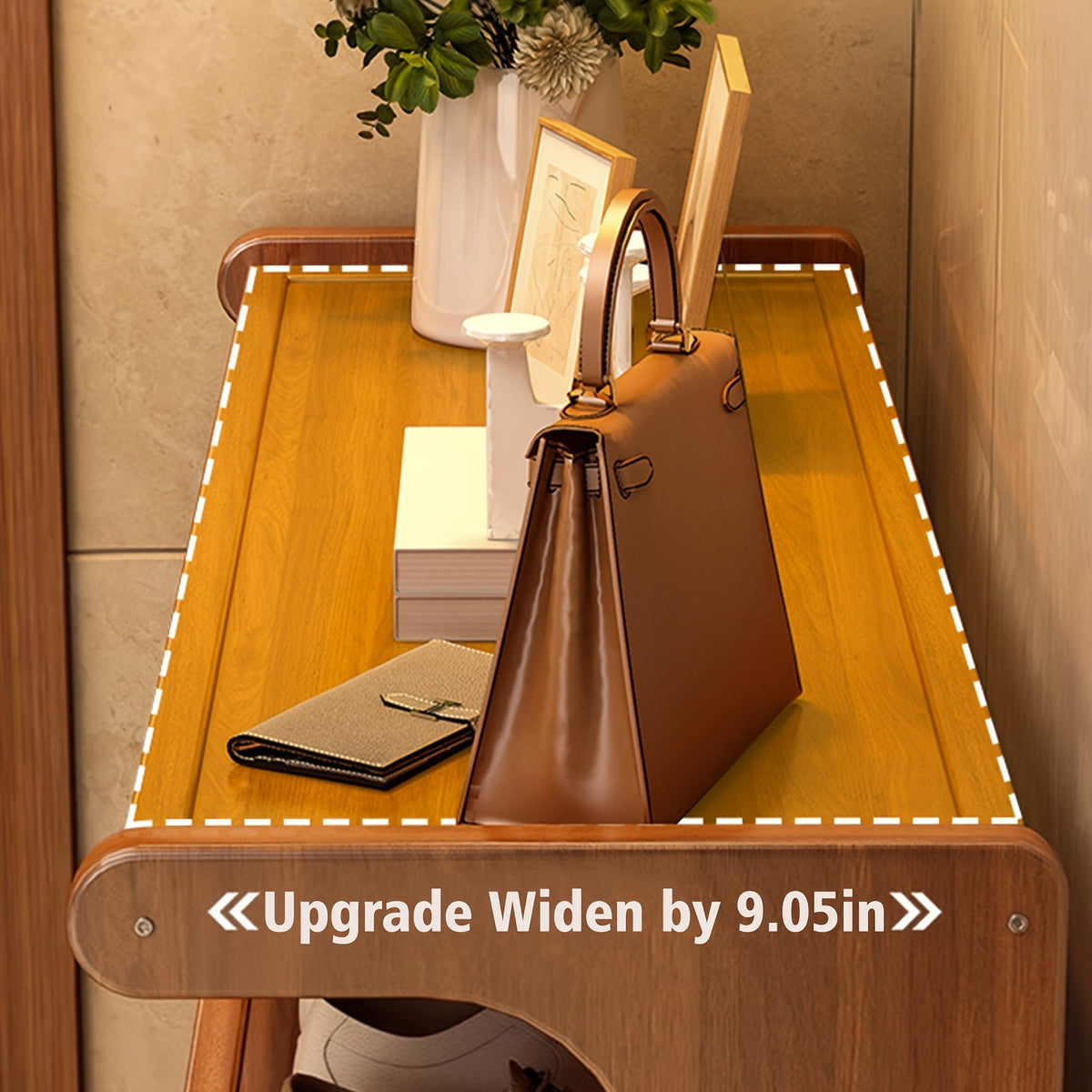 Brown handbag on a wooden table with decorative items