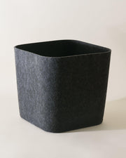 Black rectangular trash can on a white background