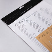 Home and laundry checklist with envelopes on a light gray background