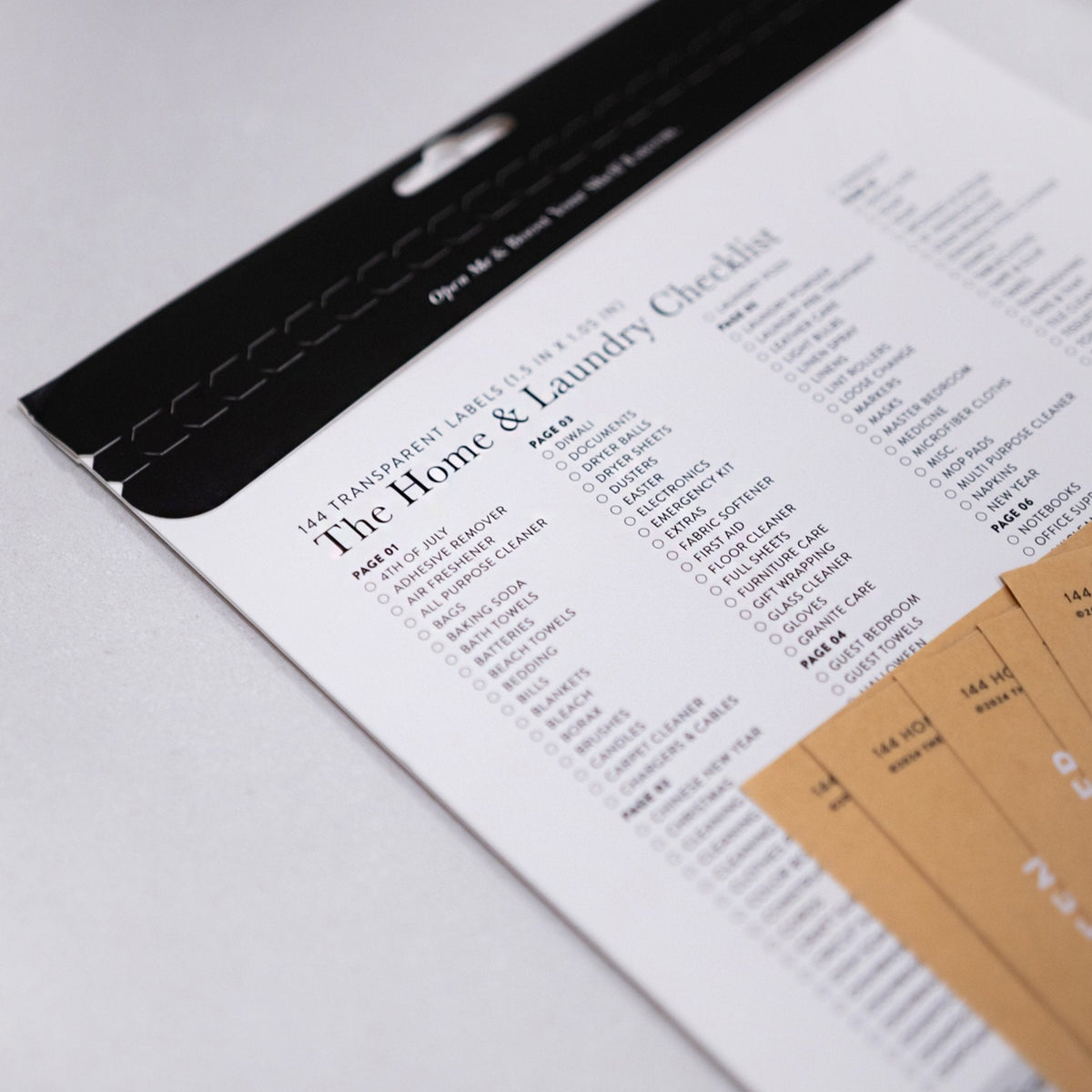 Home and laundry checklist with envelopes on a light gray background